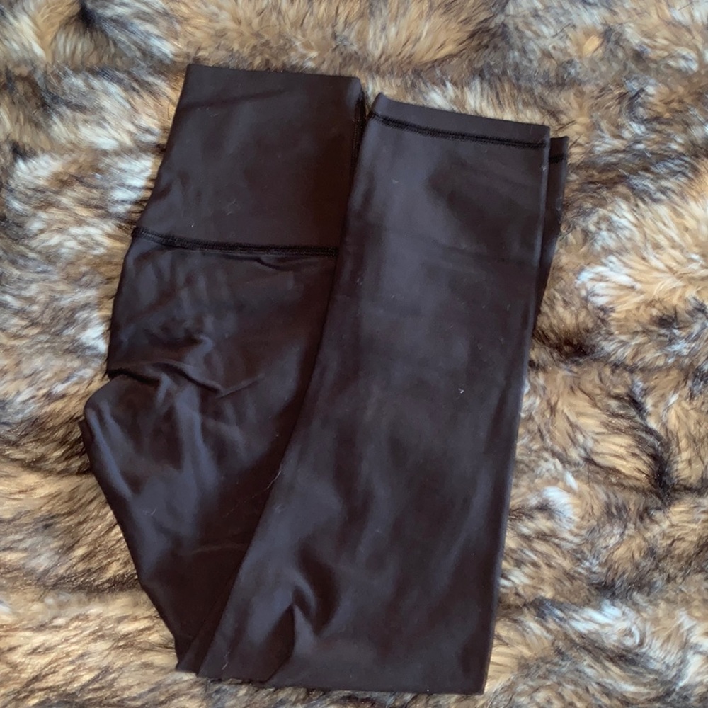 Black wonder under leggings size two